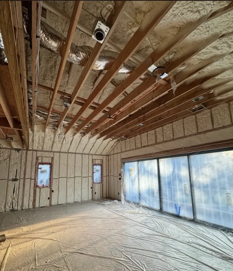 Interior walls and ceiling insulated with spray foam during new construction in Lower Macungie